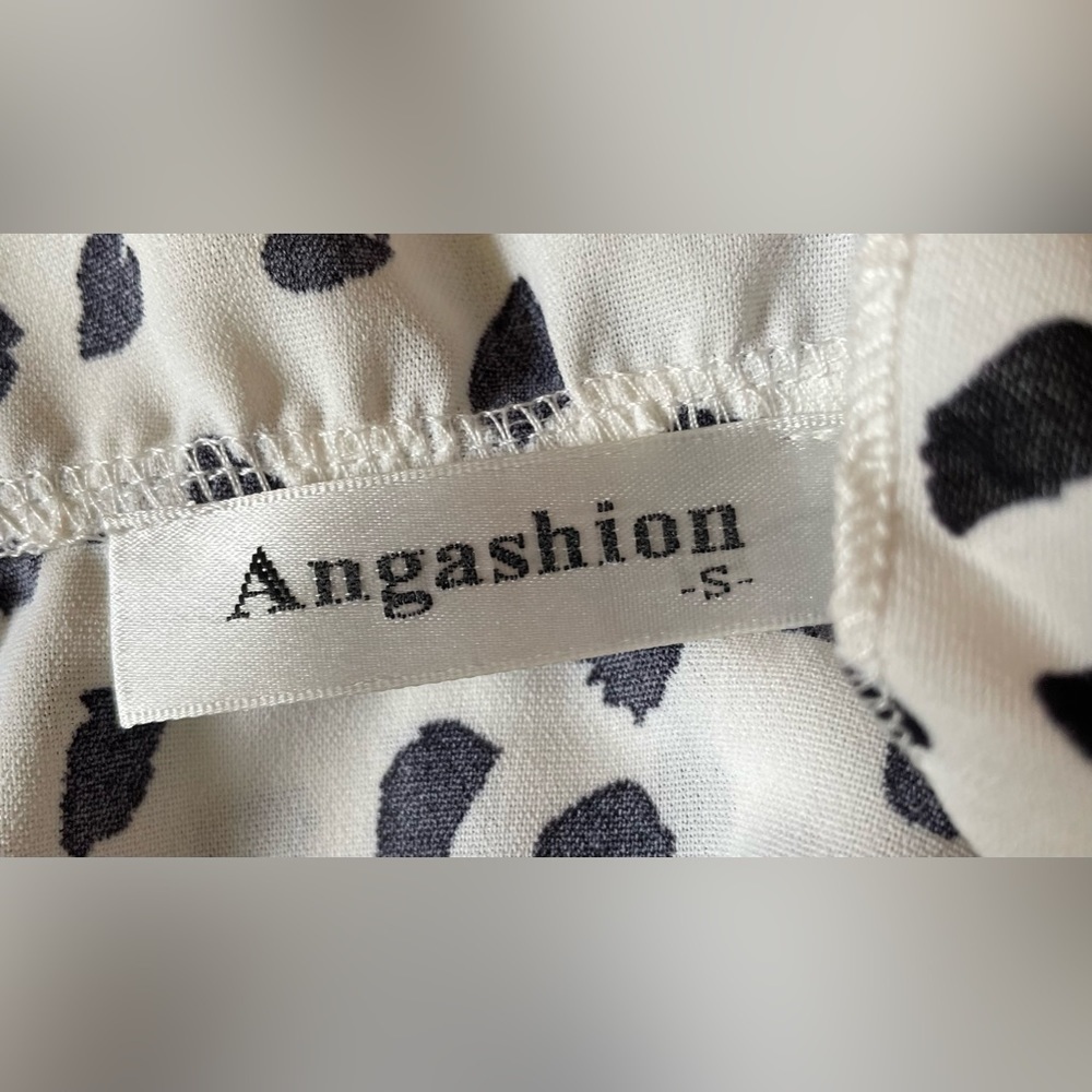 Angashion black and white tunic with peplum - Picture 6 of 8